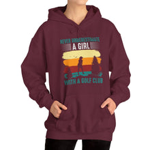 Load image into Gallery viewer, Never Underestimate a Girl with a Golf Club Hooded Sweatshirt, golf Hooded Sweatshirt /Unisex Heavy Blend™ Hooded Sweatshirt
