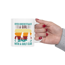 Load image into Gallery viewer, Never Underestimate a Girl with a Golf Club/ Ceramic Mug 11oz
